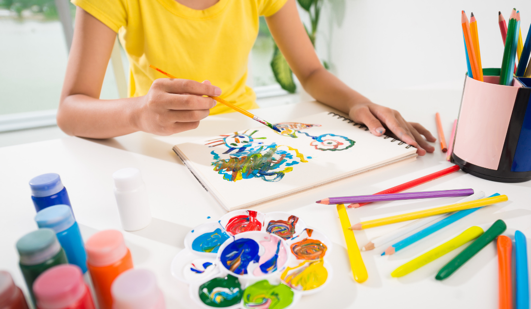Child painting and colouring