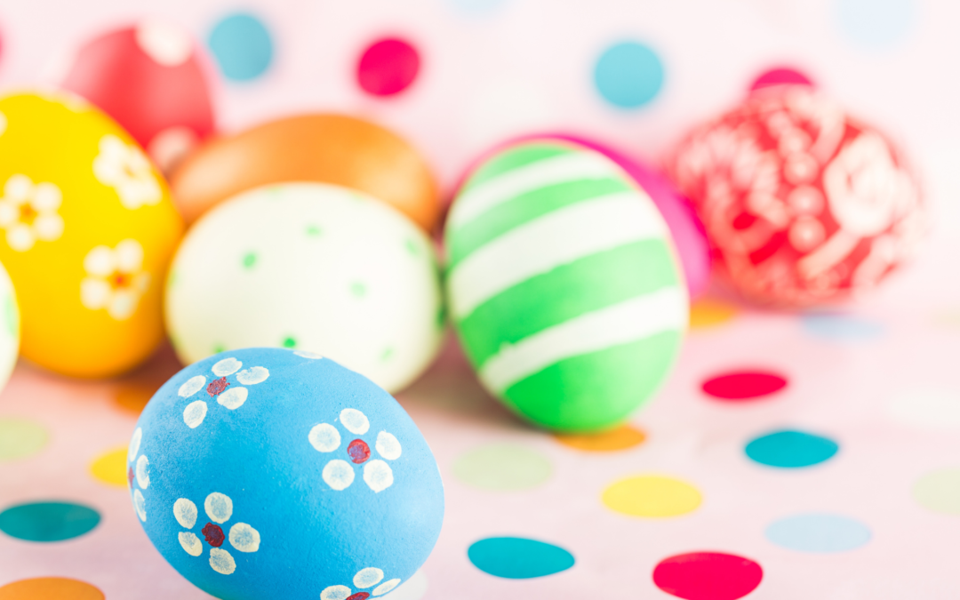 Easter eggs brightly painted with multiple colours and patterns